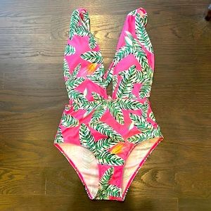 Goodnight macaroon one piece swimsuit. Low back and low cut in front- size small